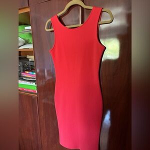 Coral (not red) dress with open back and bow